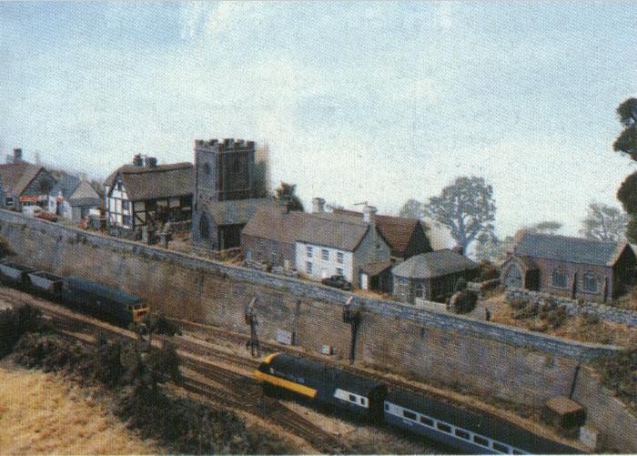  Note the electrical connection boxes 
 by the signals; details which help 
 set the period of the model. 